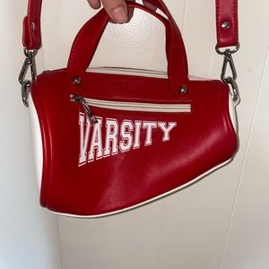 Dolls Kill varsity cheerleader purse